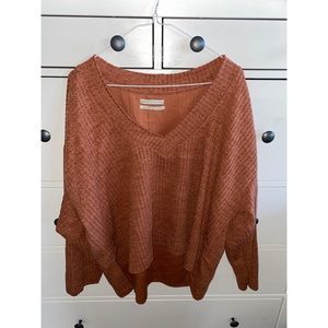 NWOT Urban outfitters size M rust colored long sleeve loose cut v neck top.